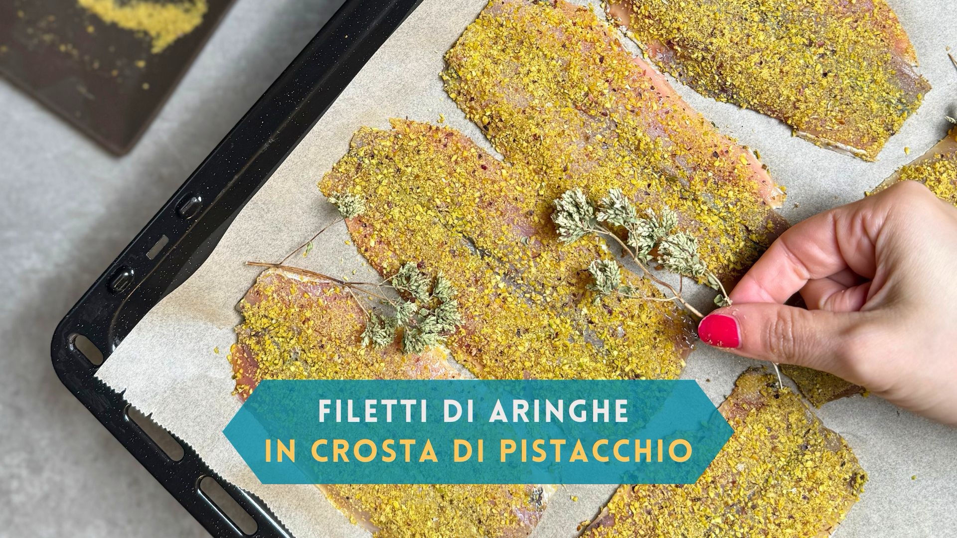 Filetti di aringhe al forno in crosta di pistacchio