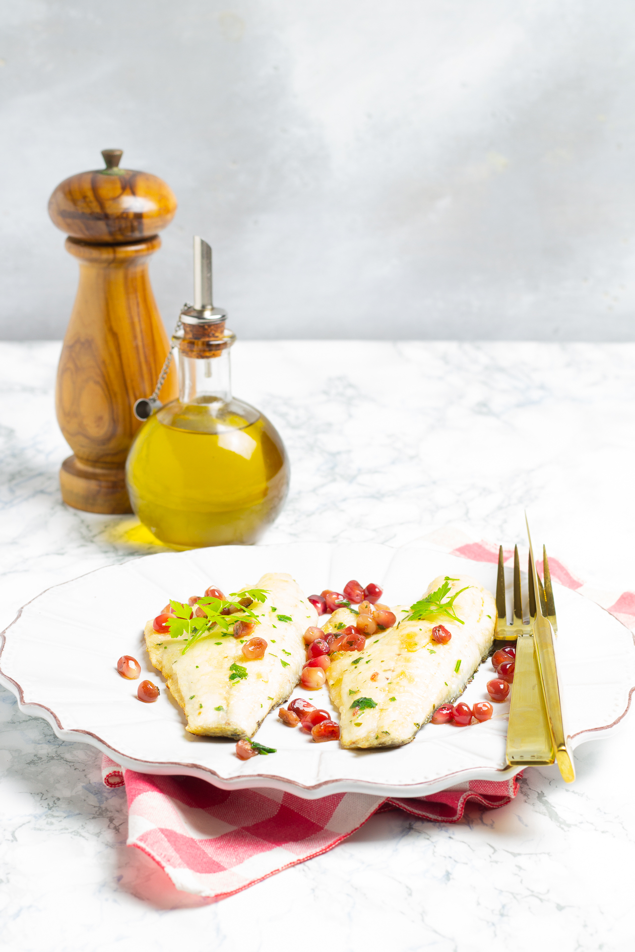 Filetti di branzino al melograno