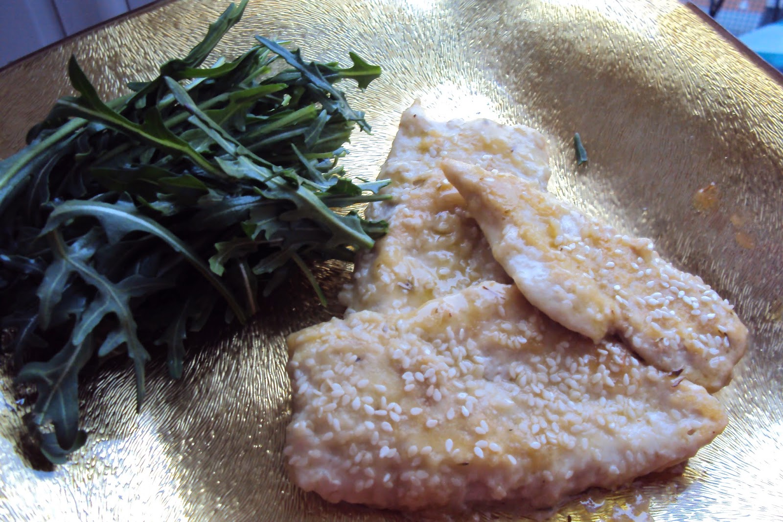 Filetti di pollo al sesamo con rucola