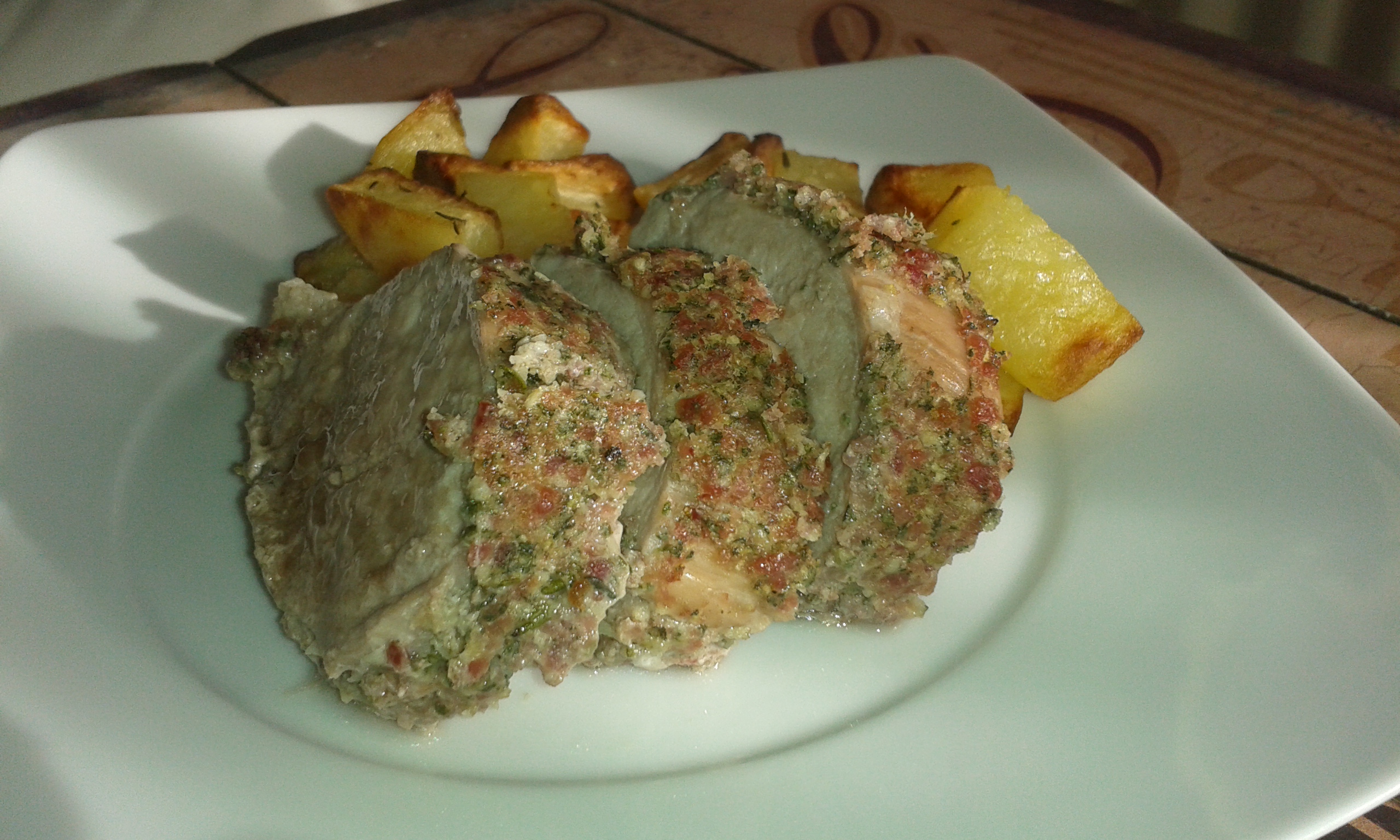 Filetto di maiale alle erbe fini e patate arrosto