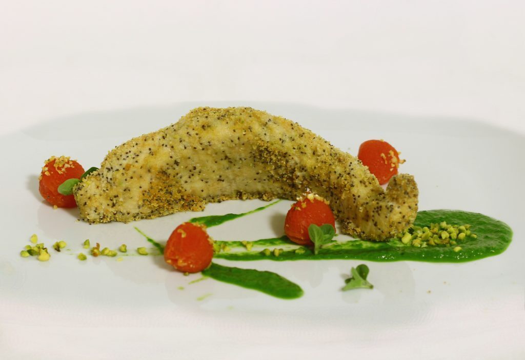 Filetto di storione al forno con papavero e pistacchio