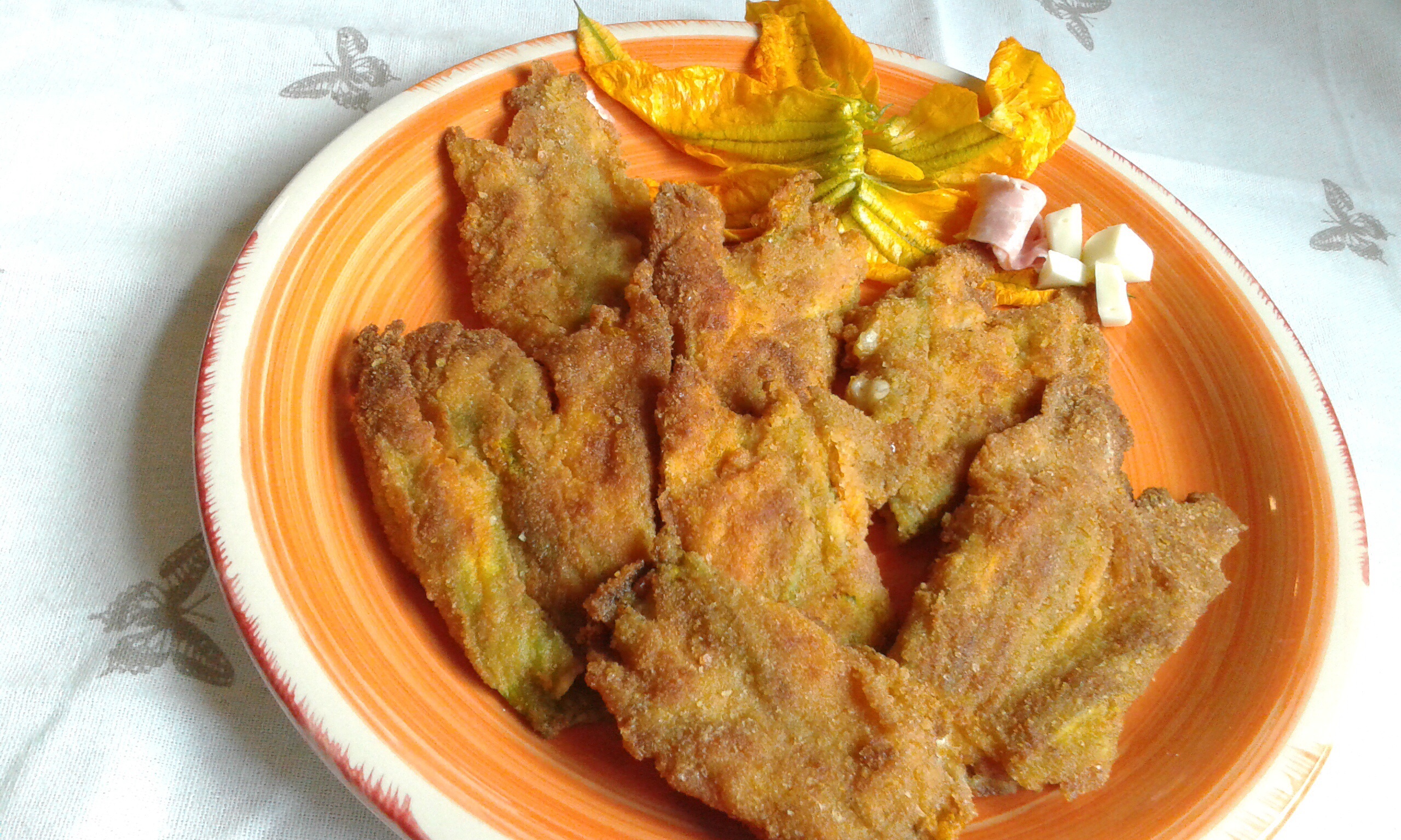 Fiori di zucca ripieni e dorati