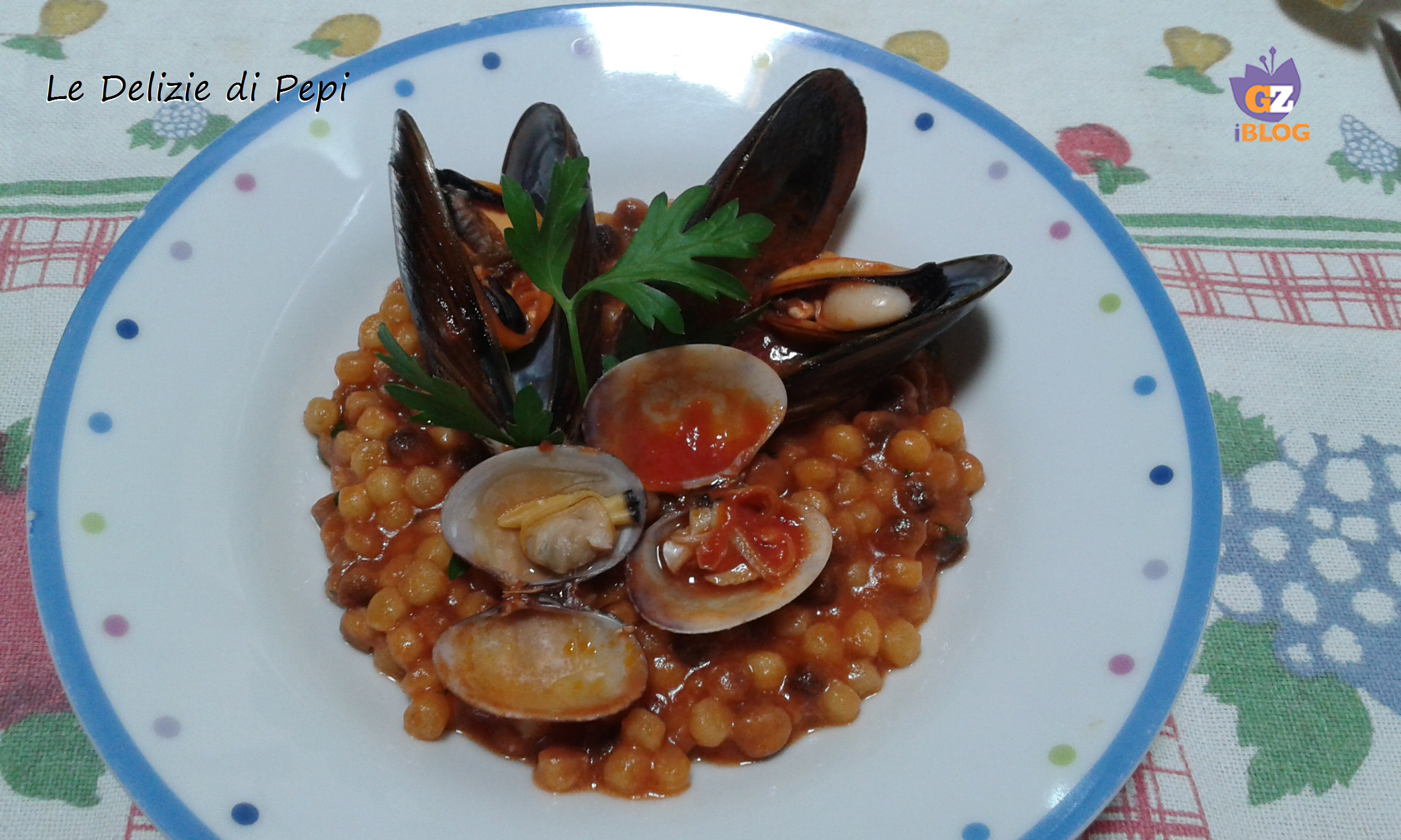 Fregola risottata con cozze e vongole