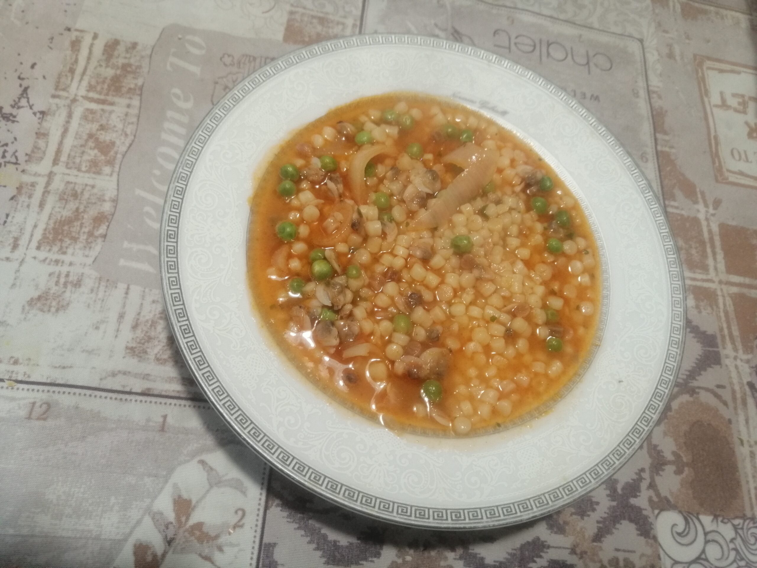 Fregola sarda con vongole e piselli