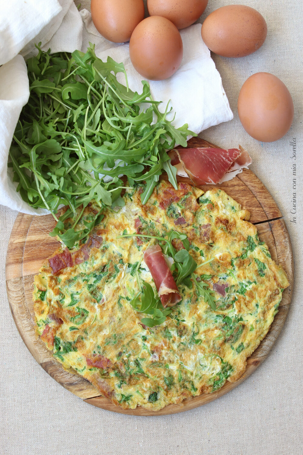 Frittata con rucola e speck