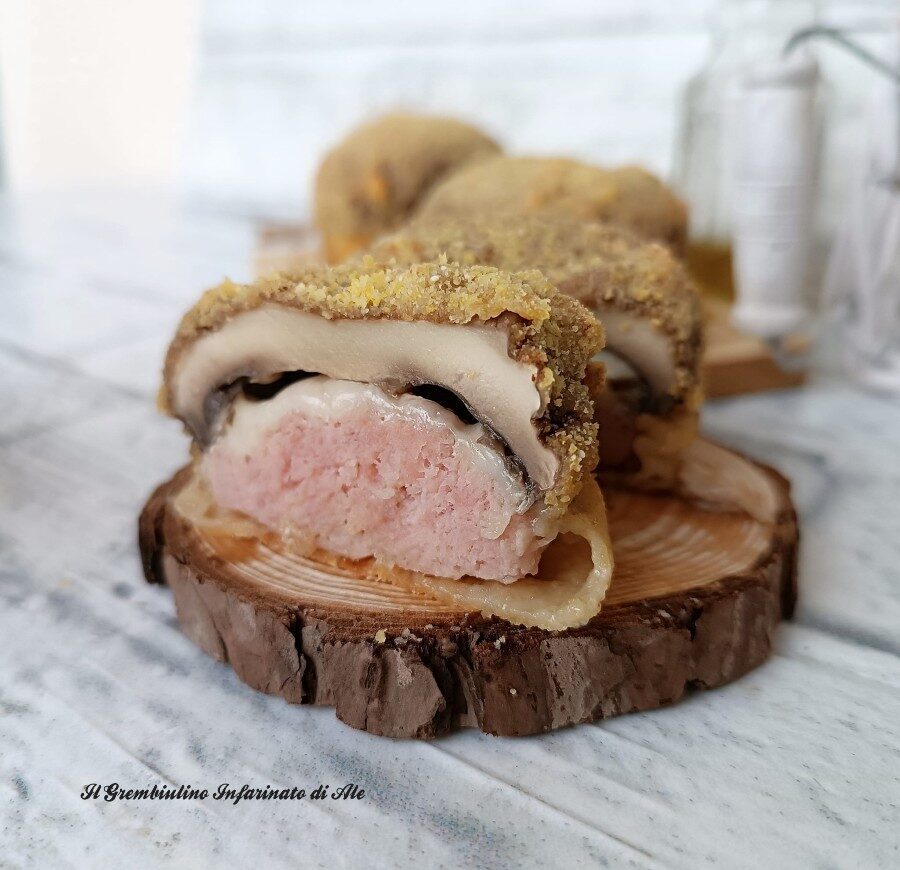 Funghi ripieni di salsiccia e scamorza
