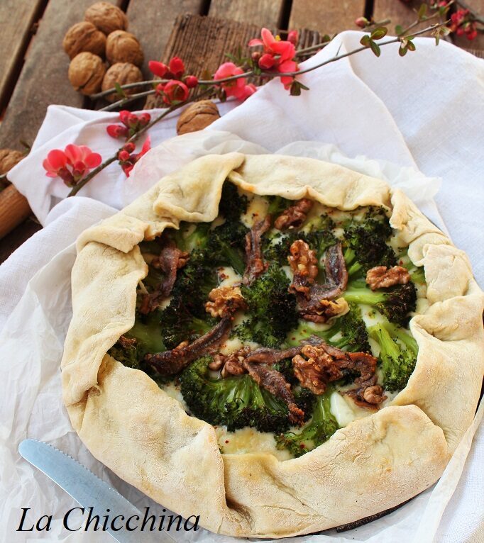 Galette con besciamella al maccagno, broccoli, acciughe e noci