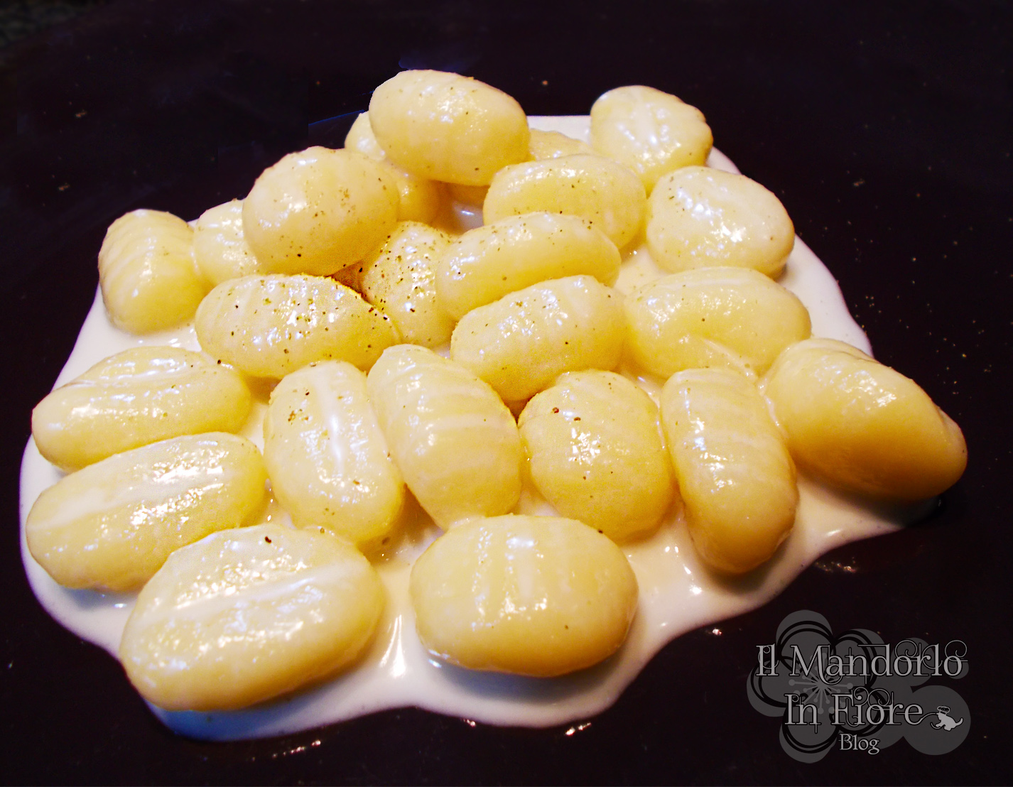 Gnocchi ai quattro formaggi e pepe verde