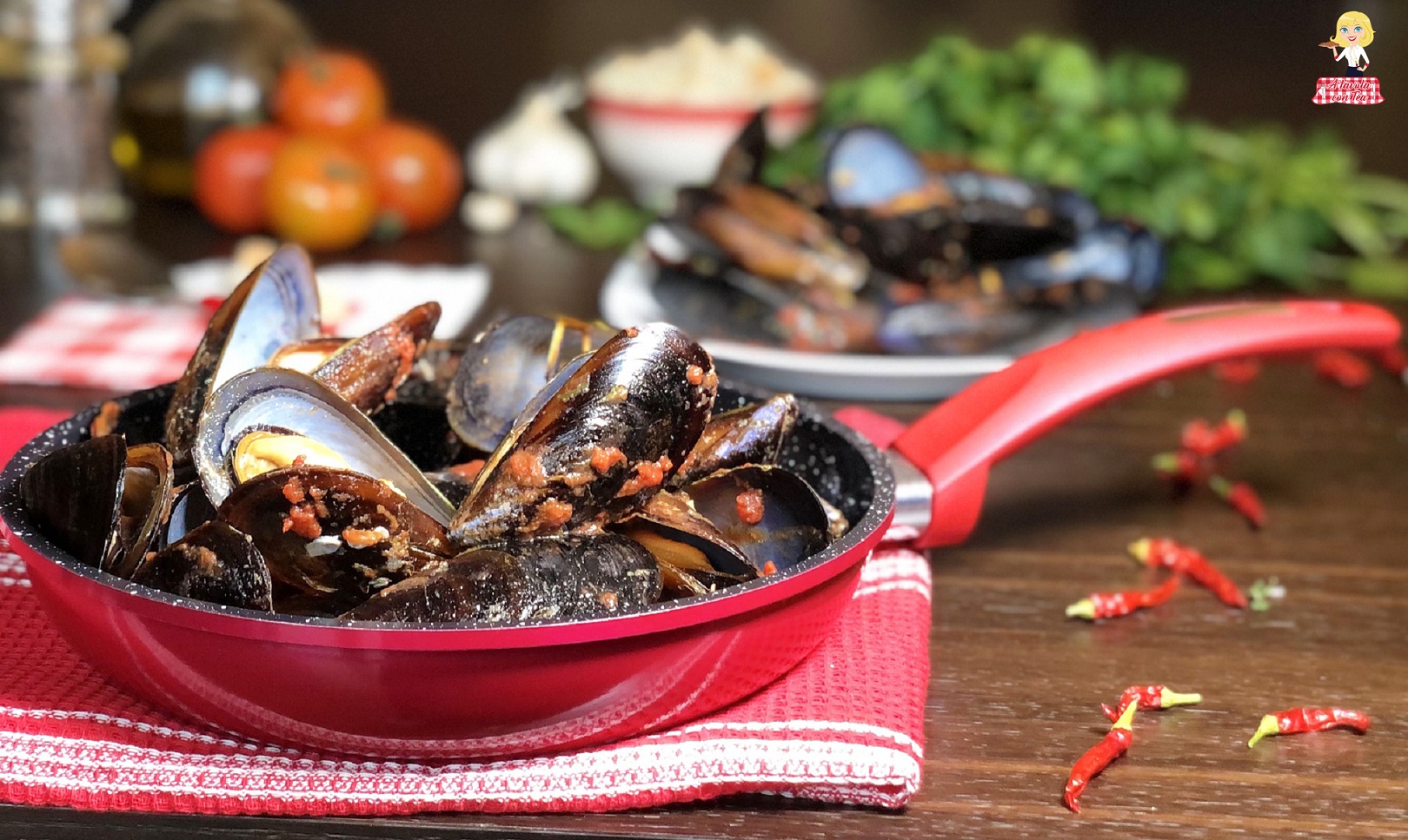 Impepata di cozze al pomodoro