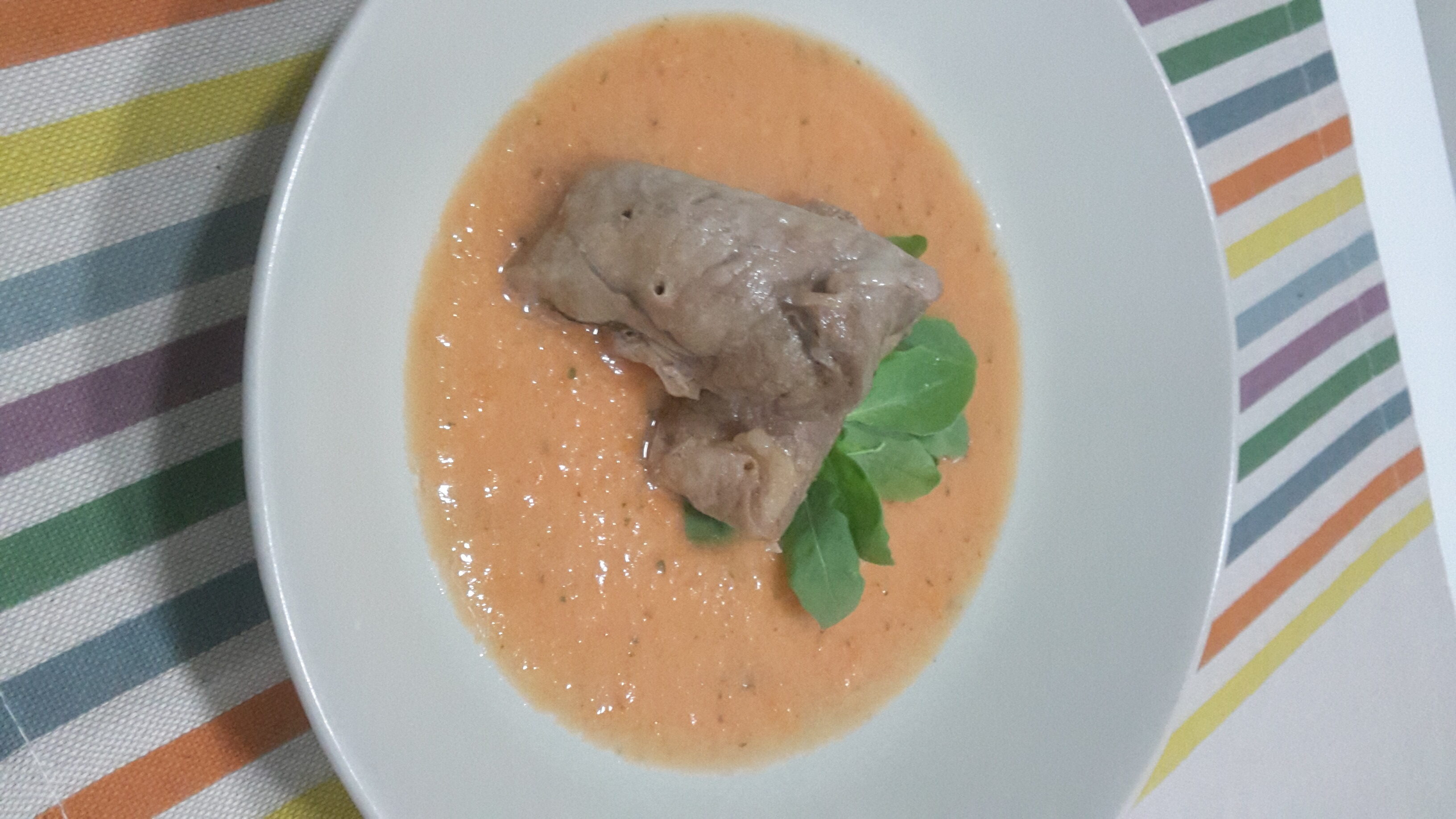 Involtini di carne ripieni di rucola e caciotta fresca