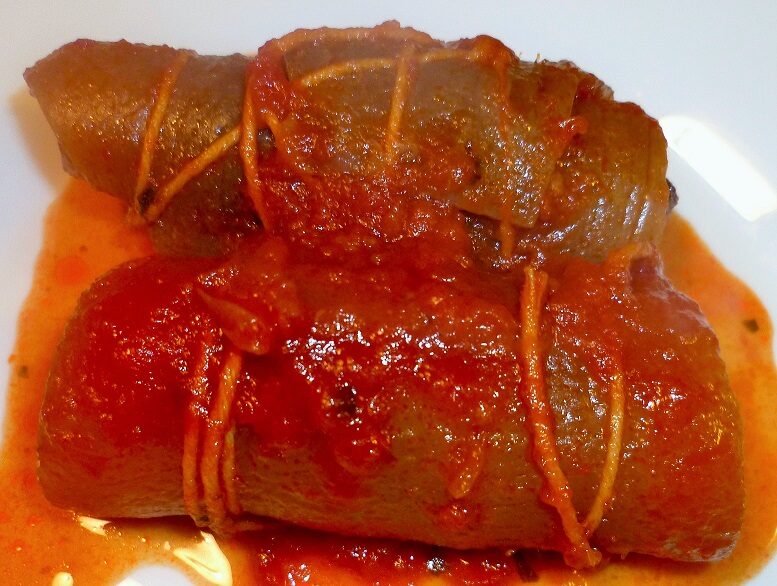 Involtini di cotenna di maiale al sugo