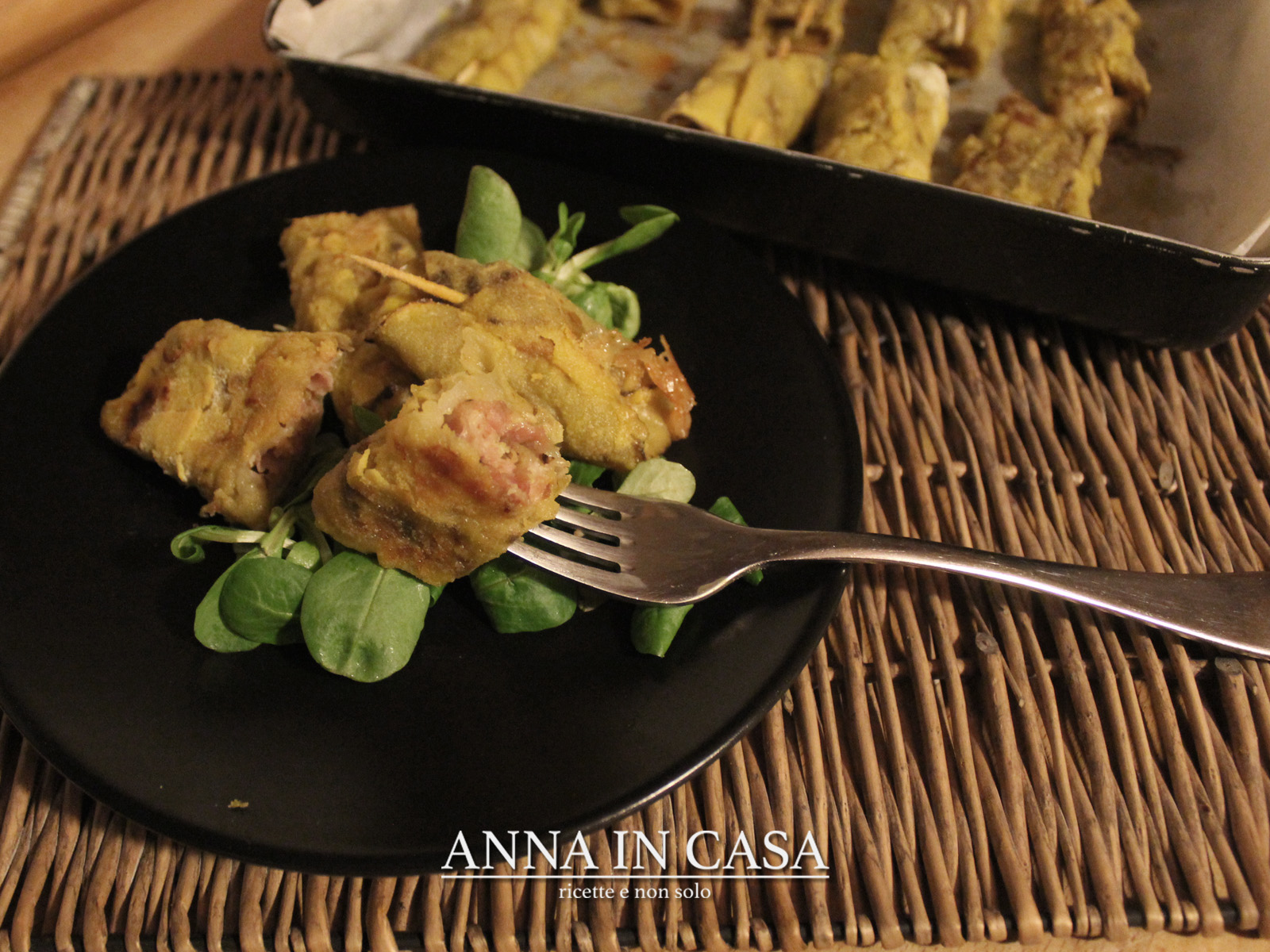 Involtini di melanzane con speck e frutta secca