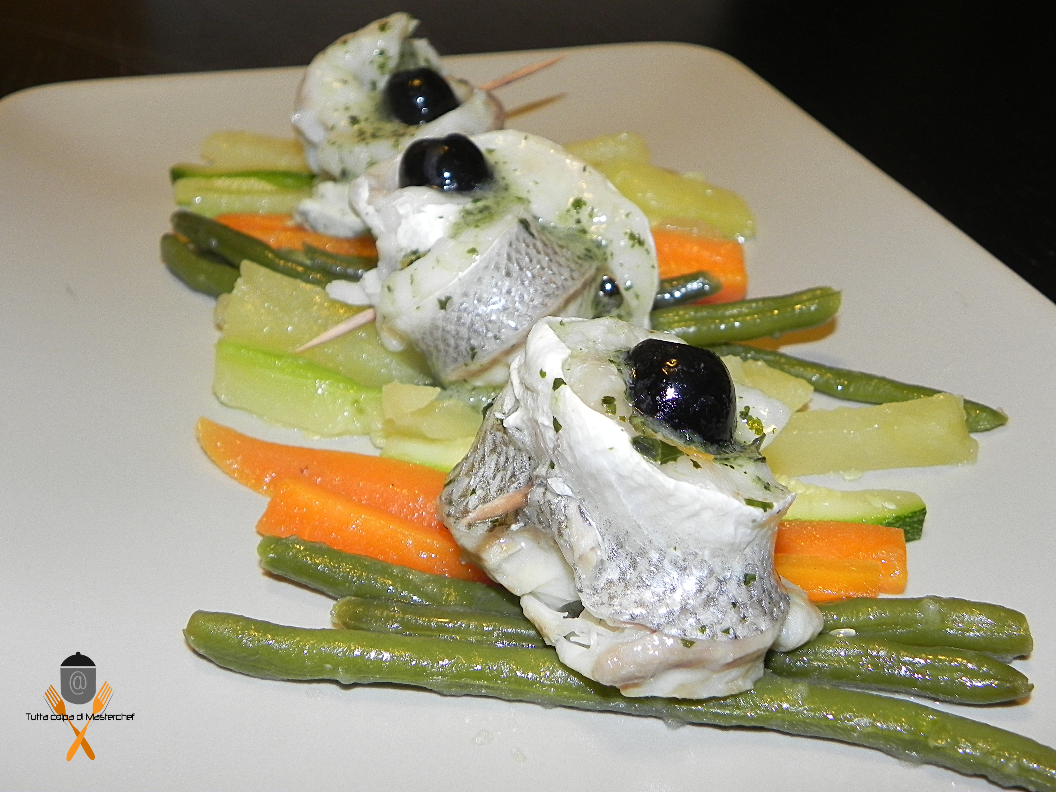 Involtini di spigola con verdure al vapore