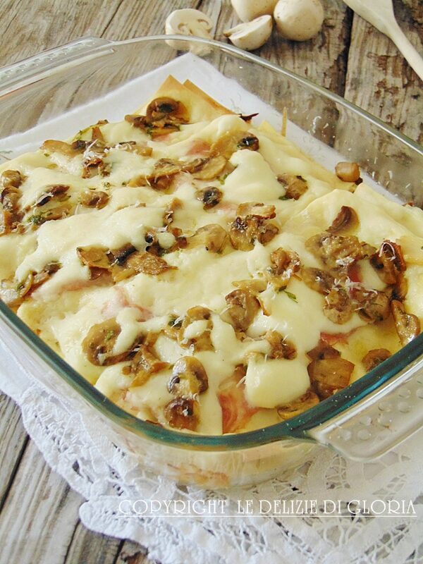 Lasagne ai funghi e prosciutto cotto