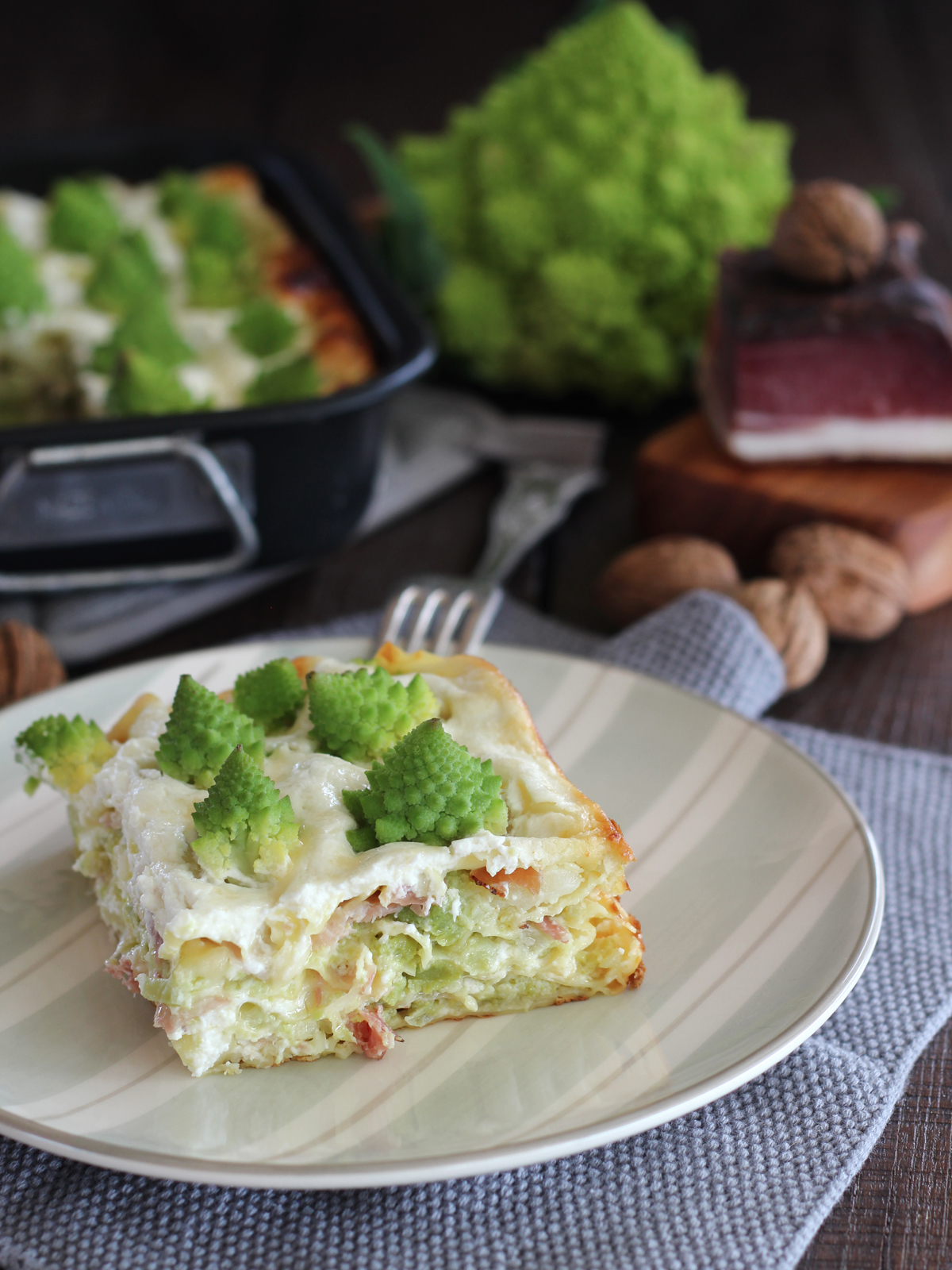 Lasagne con besciamella di robiola, broccolo romanesco e speck