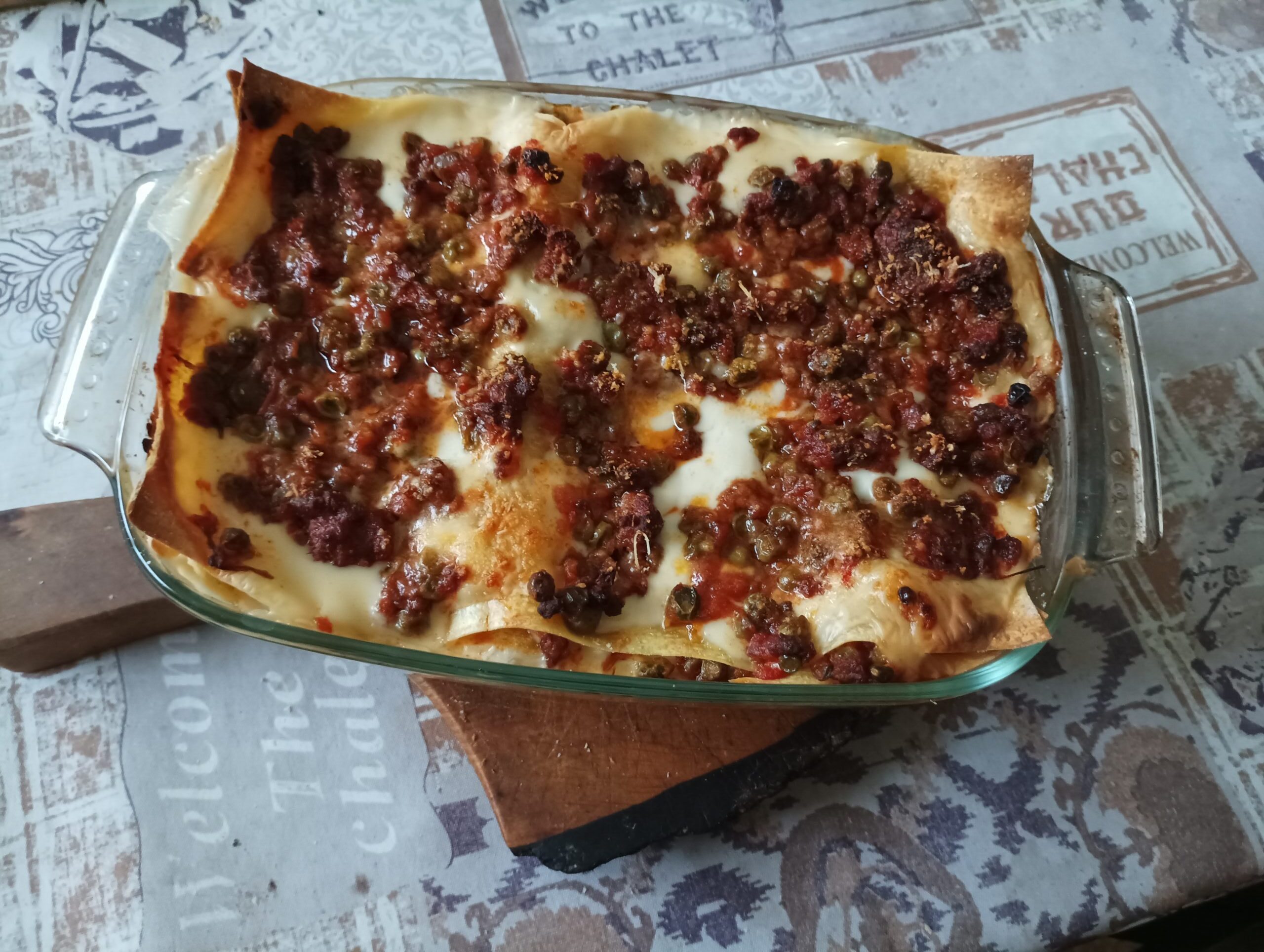Lasagne con ragù di salsiccia e piselli