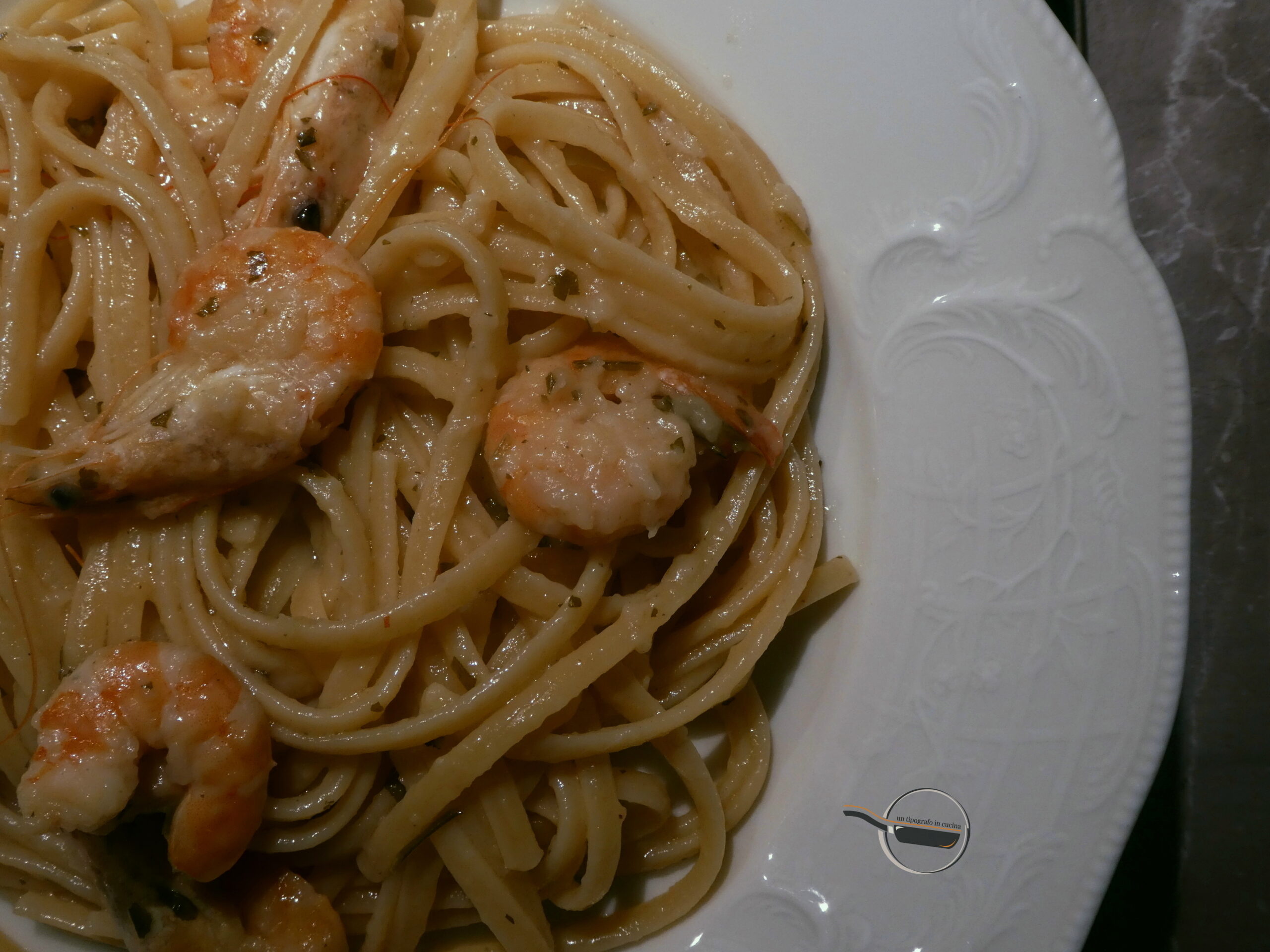 Linguine alle mazzancolle, cointreau e vino bianco.