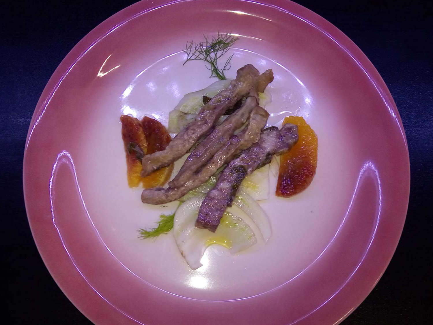Listarelle di lonza con finocchio e arancia
