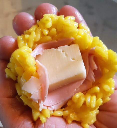 Medaglioni di “risotto” con prosciutto e formaggio