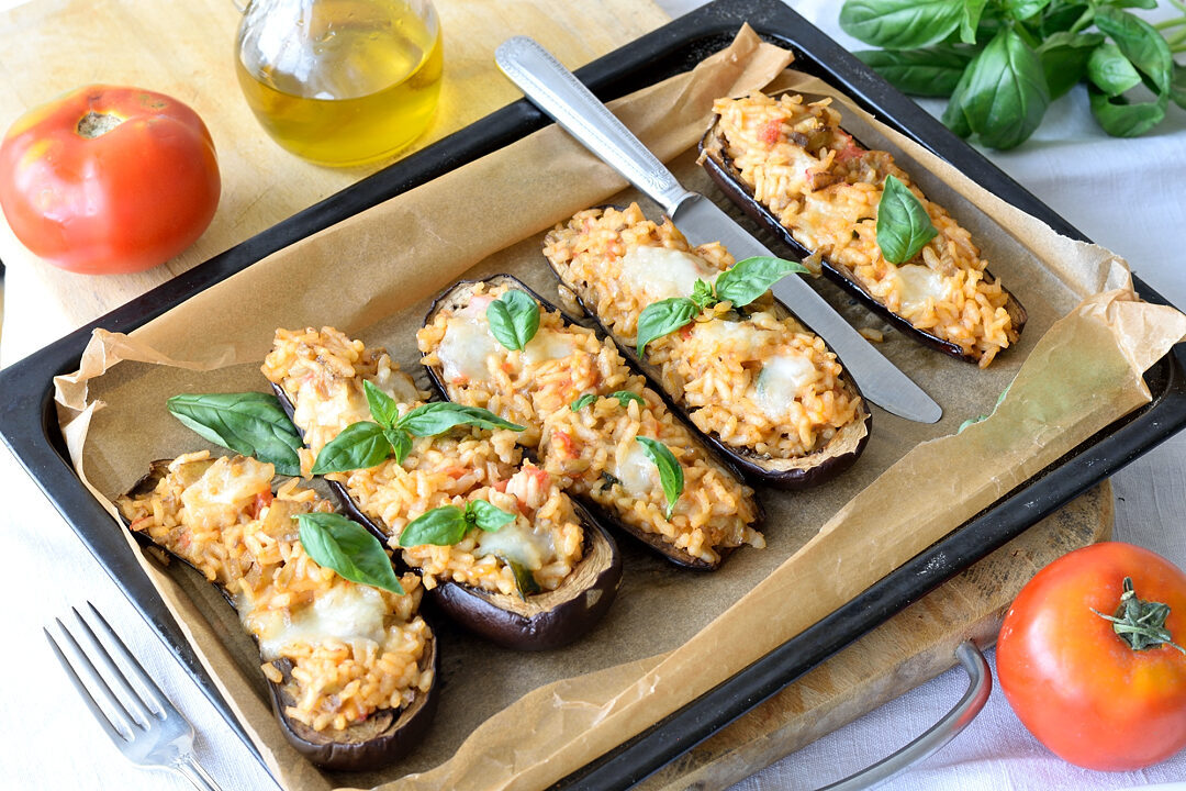 Melanzane ripiene di riso al forno filanti