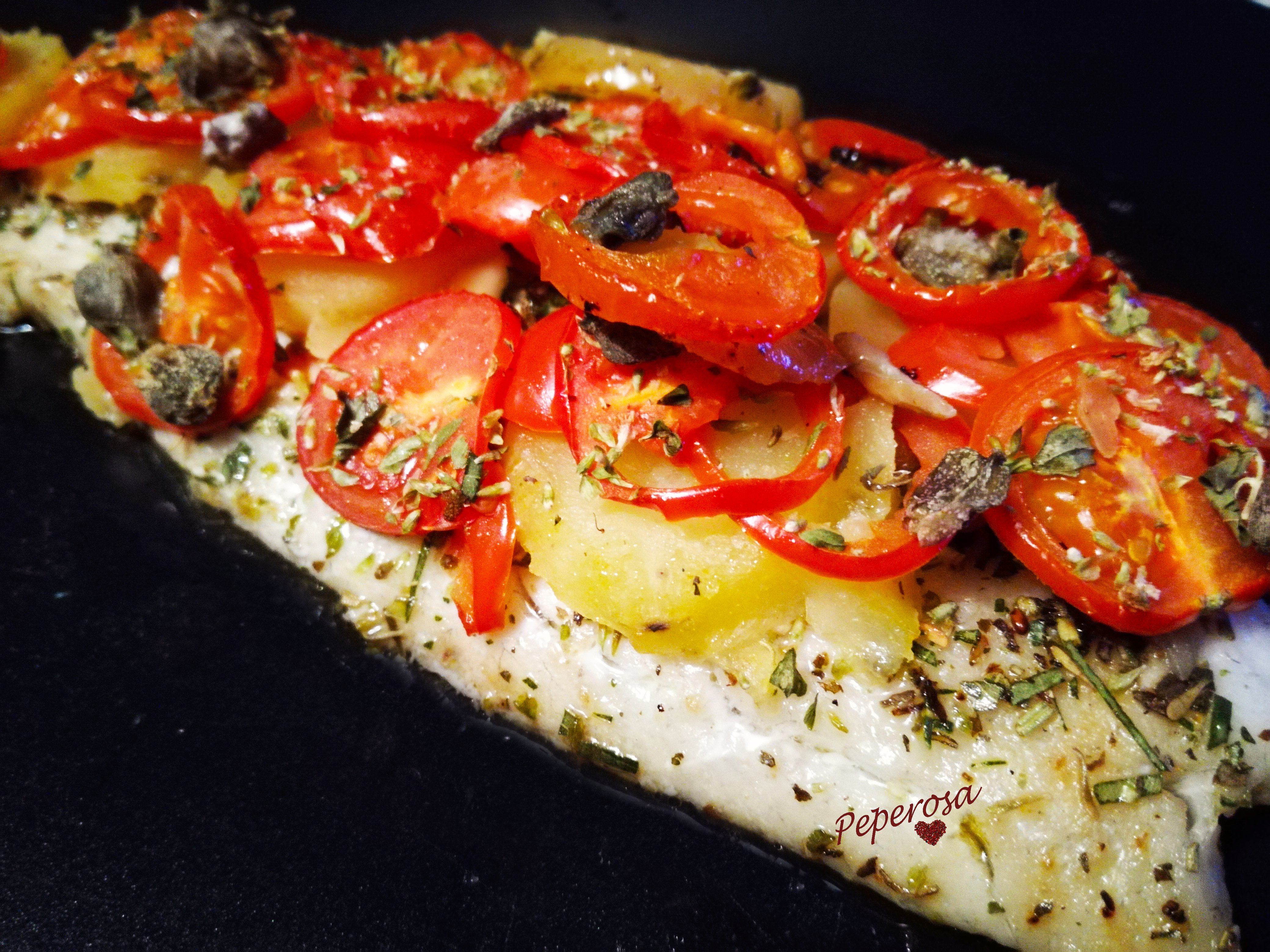 Merluzzo al forno con patate e pomodorini