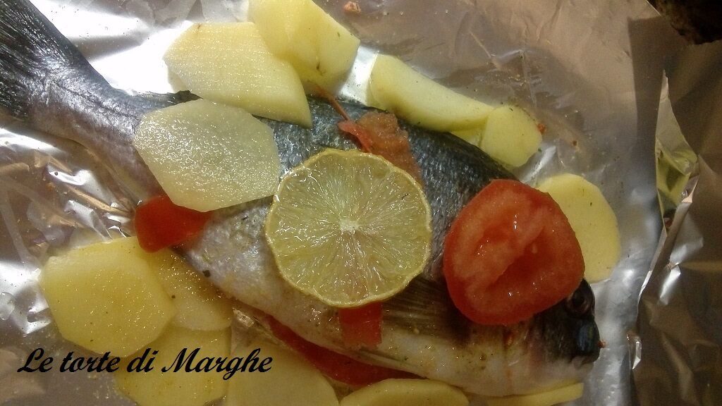 Orata al cartoccio con patate al forno..