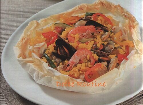 Paella al cartoccio con carne e pesce