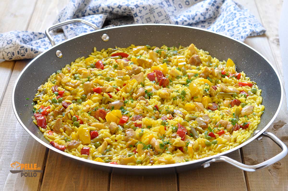 Paella valenciana con carne e verdure