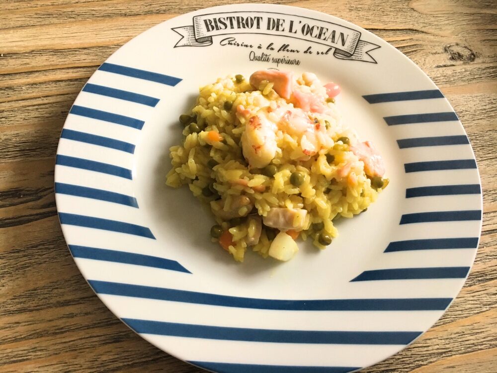 Paella veloce di carne e pesce