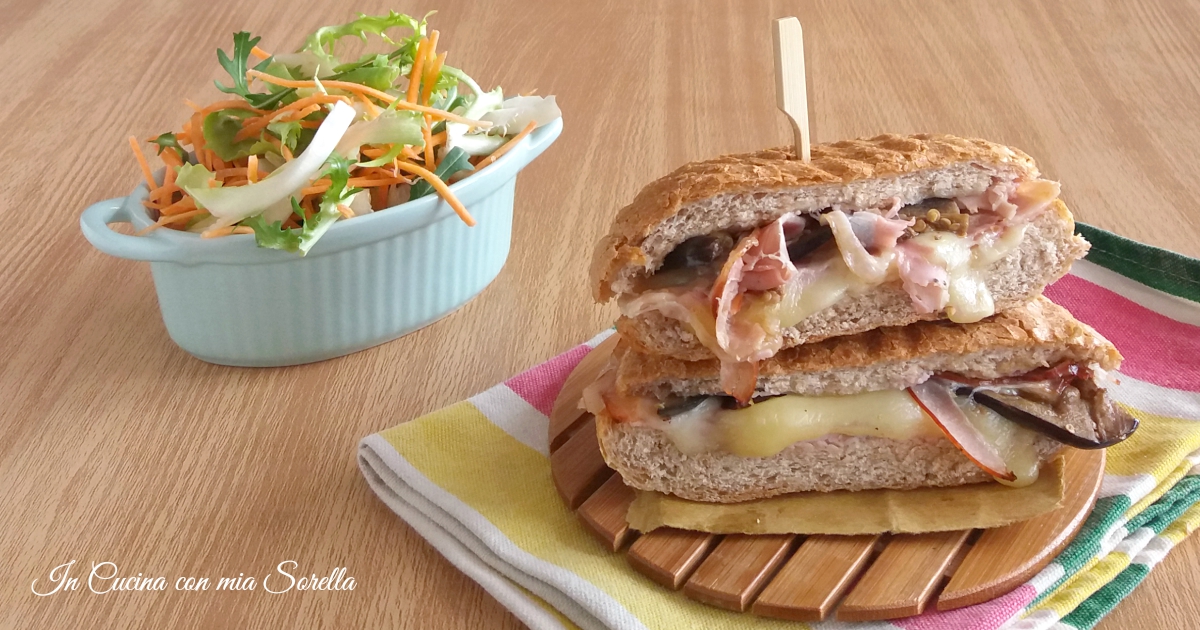 Panino filante con arrosto e melanzana