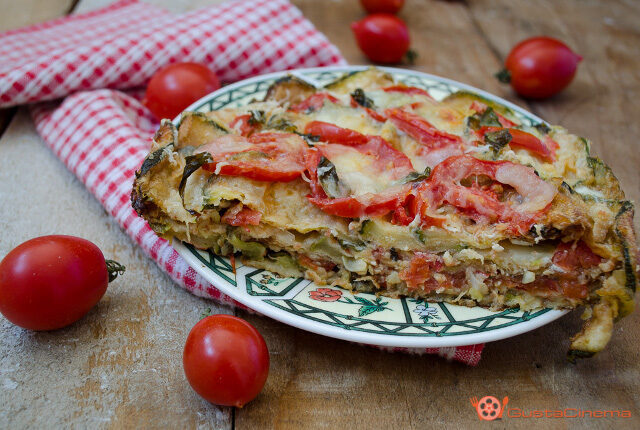 Parmigiana di zucchine con pomodorini e scamorza