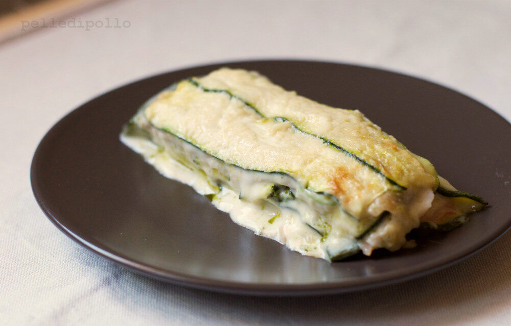 Parmigiana di zucchine con prosciutto e besciamella