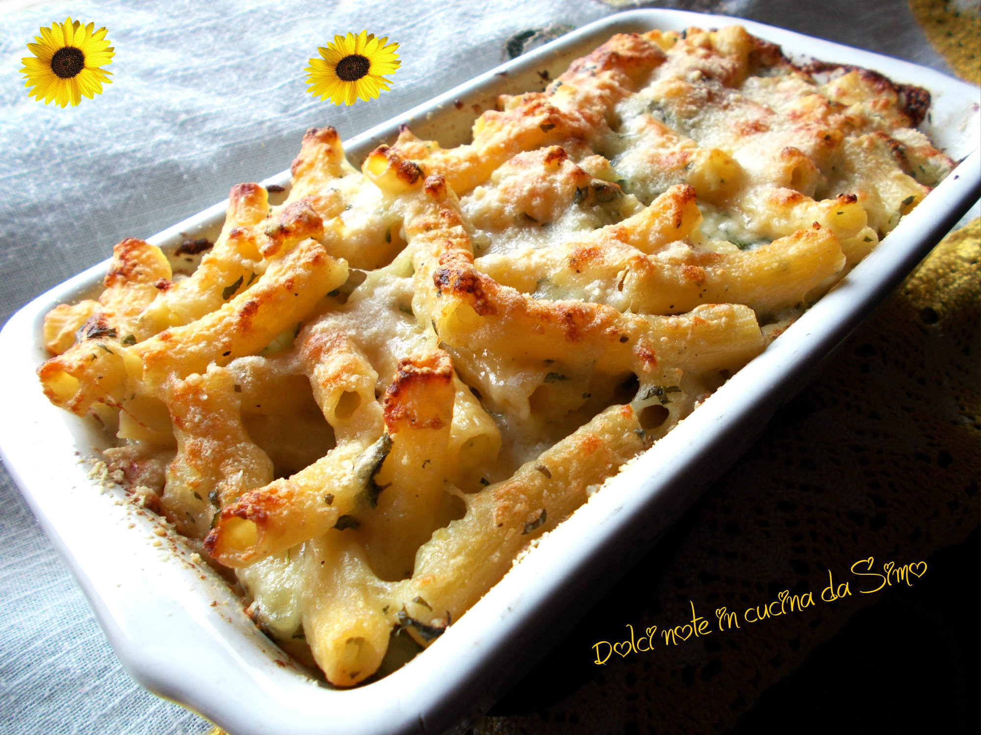 Pasta al gratin con patate rucola e crescenza
