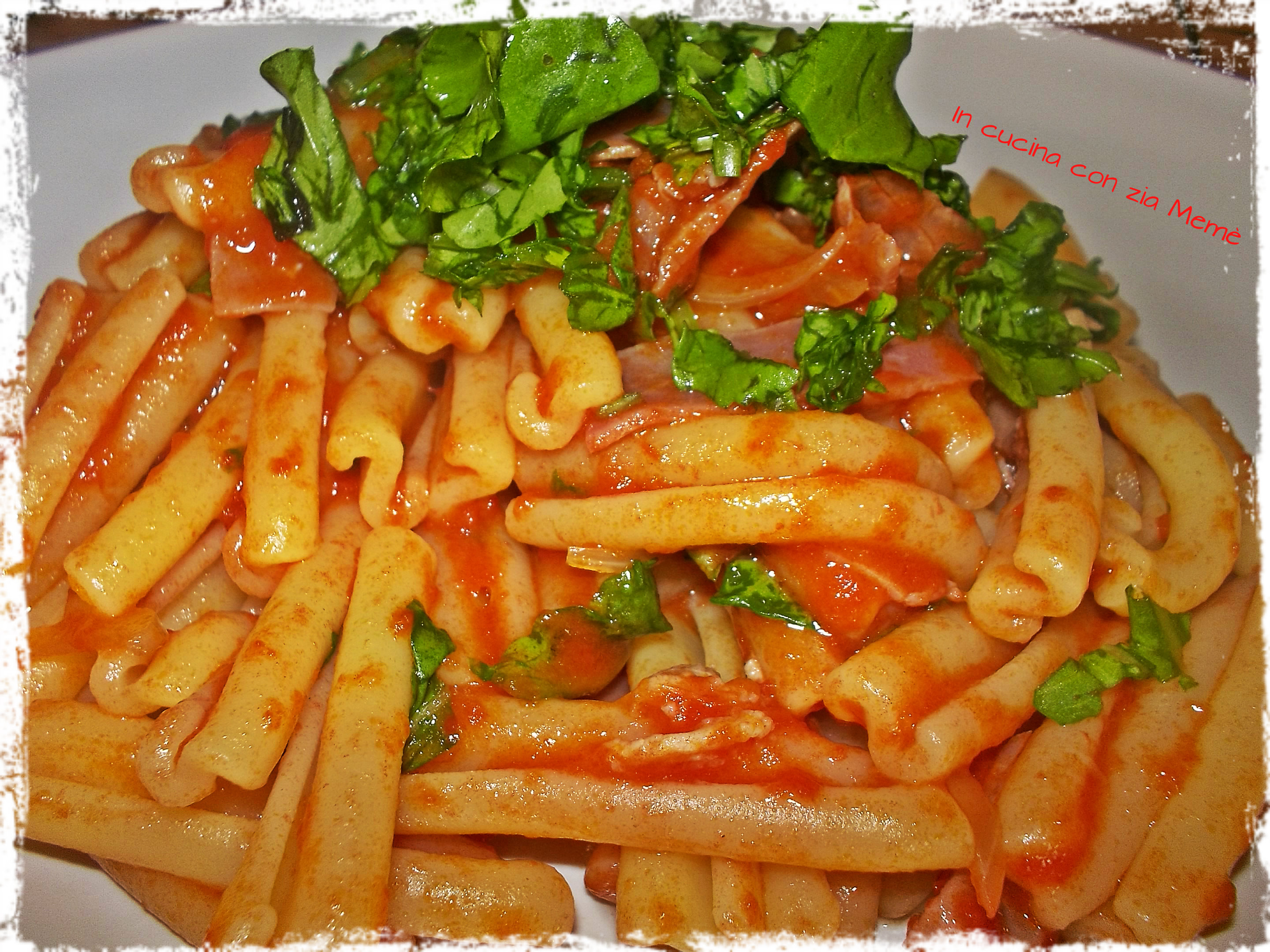 Pasta con prosciutto crudo e rucola