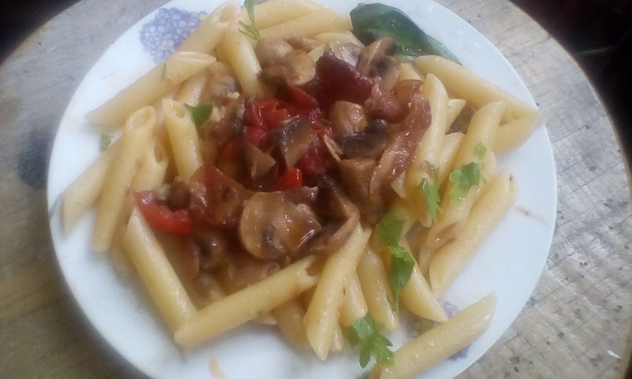 Pennette speck e funghi