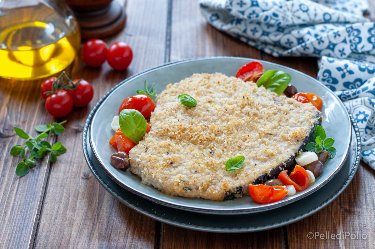 Pesce spada al forno con pomodorini e olive