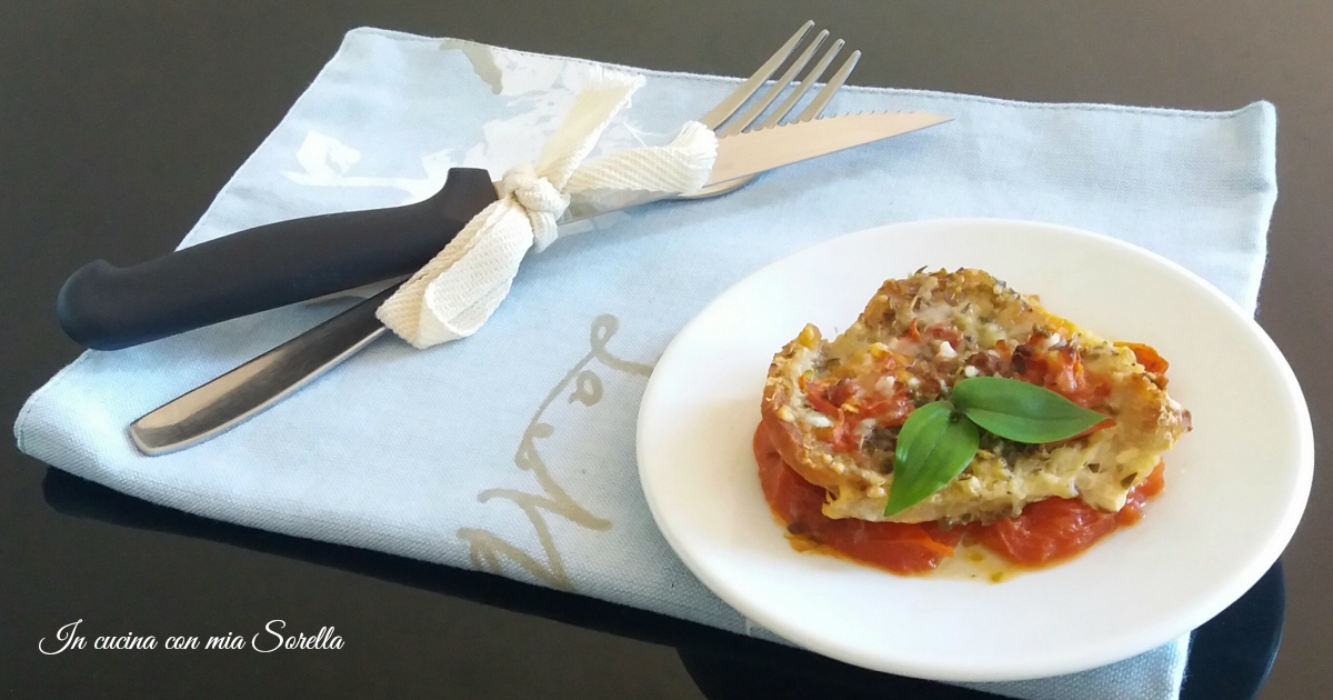 Petto di pollo al forno con pomodori e parmigiano