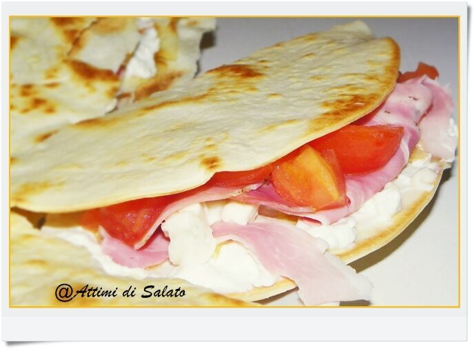 Piadine con prosciutto di praga stracchino e pomodori