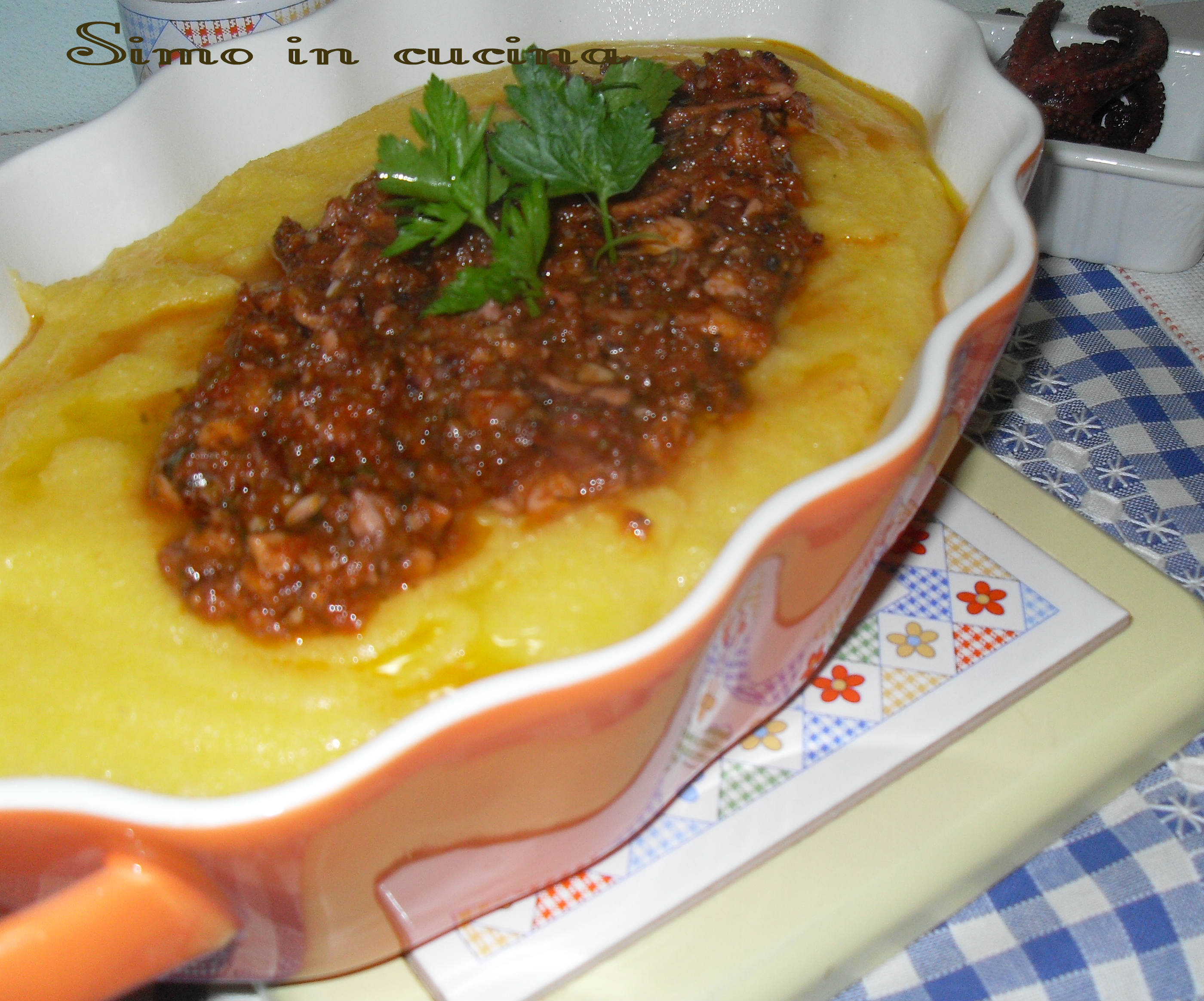 Polenta con sugo di polpo