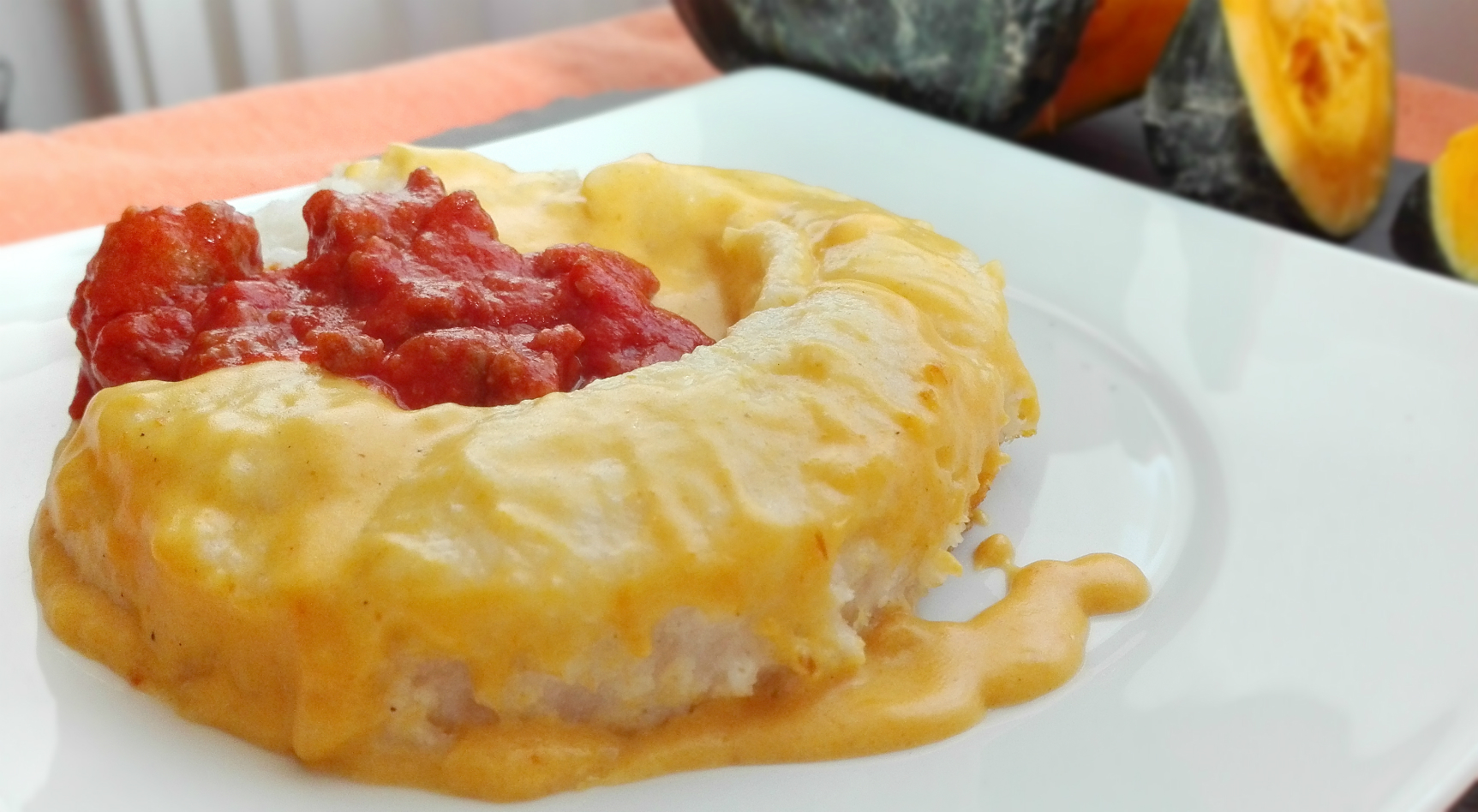Polenta di riso, zucca e salsiccia