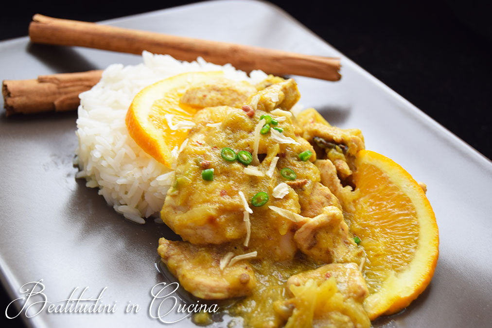 Pollo al curry e arancia