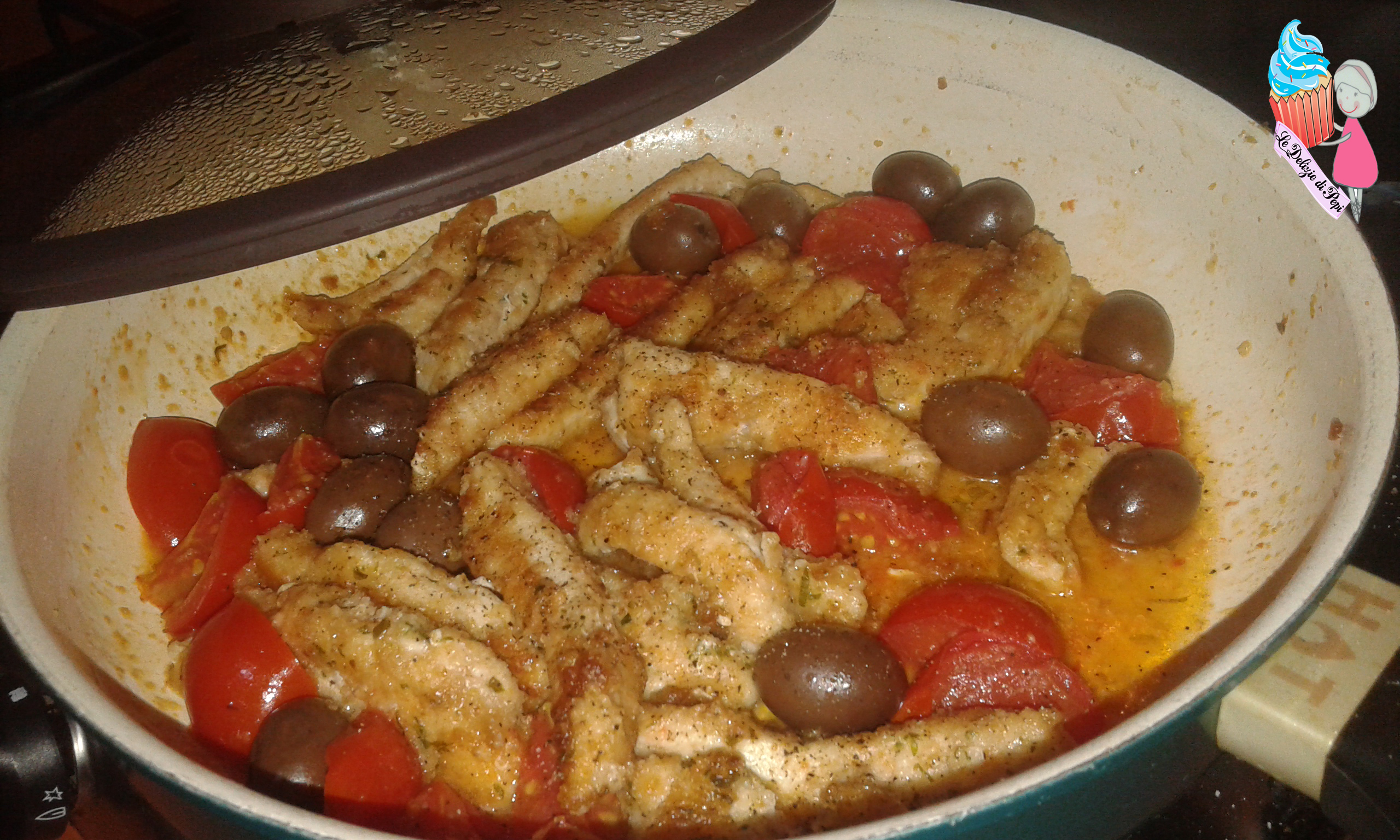 Pollo al parmigiano con pomodorini e olive