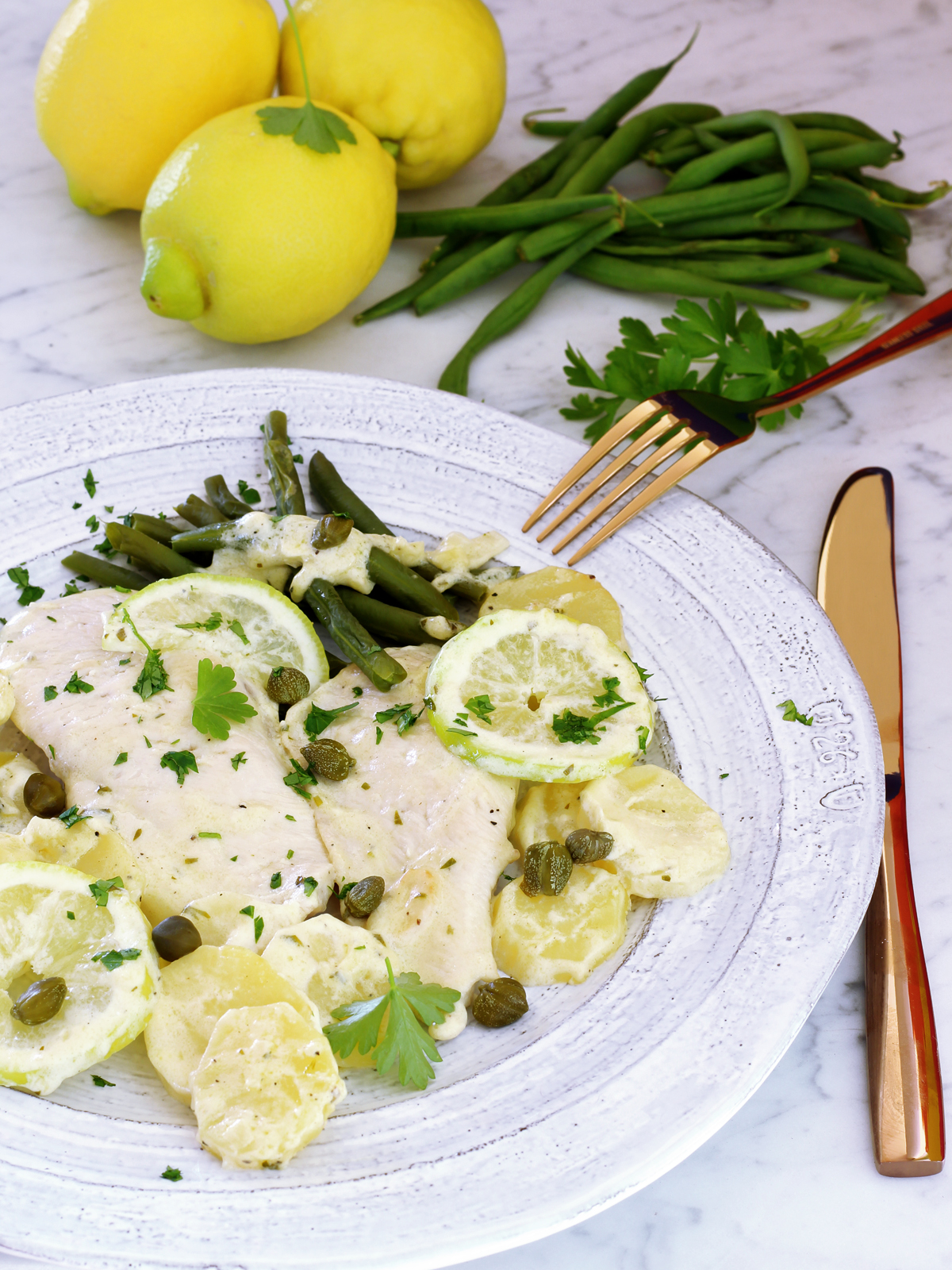 Pollo cremoso con fagiolini, capperi e limone