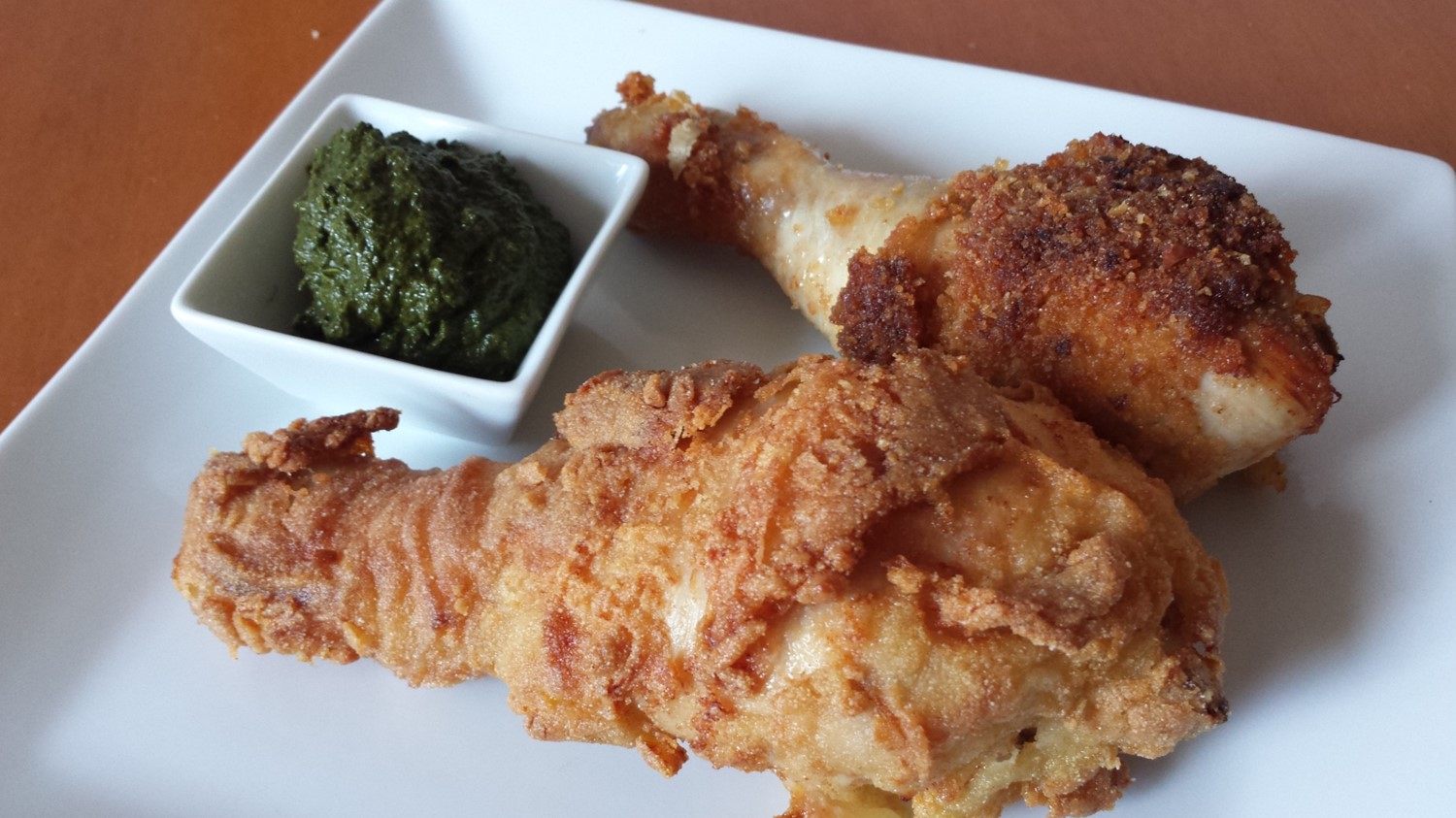 Pollo fritto alla annurca con riduzione di cavolo nero