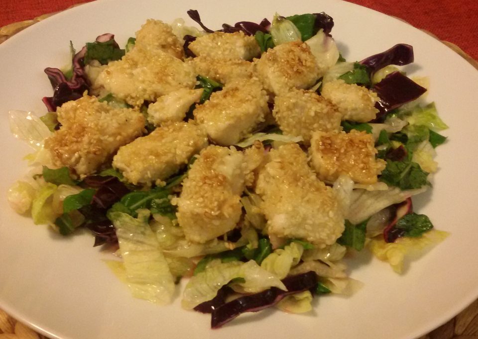 Pollo lime e sesamo su letto di insalata mista
