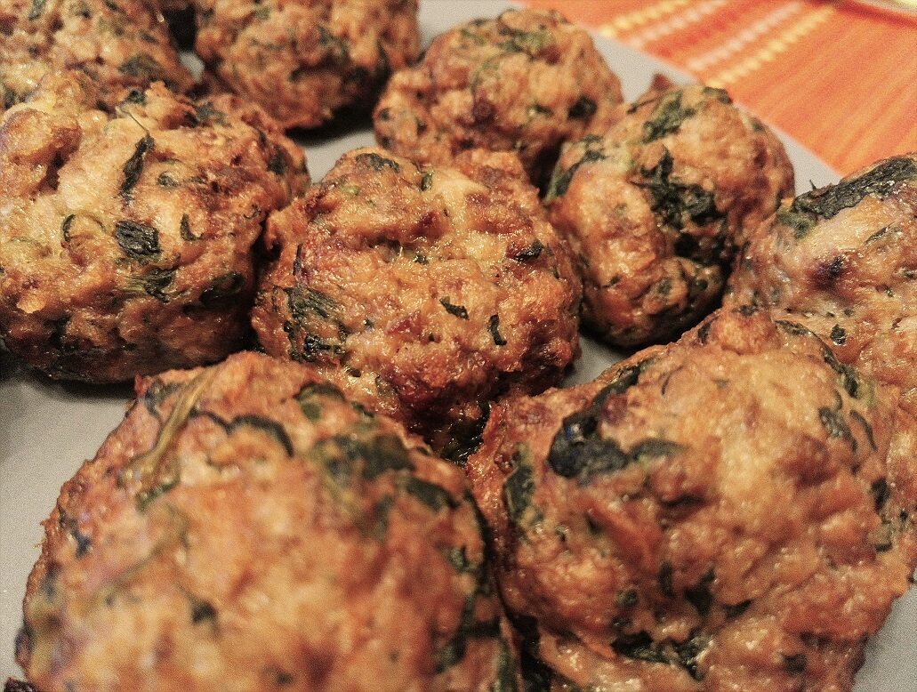 Polpette di cavallo e spinaci al forno