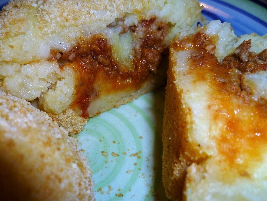 Polpette di patate ripiene al forno