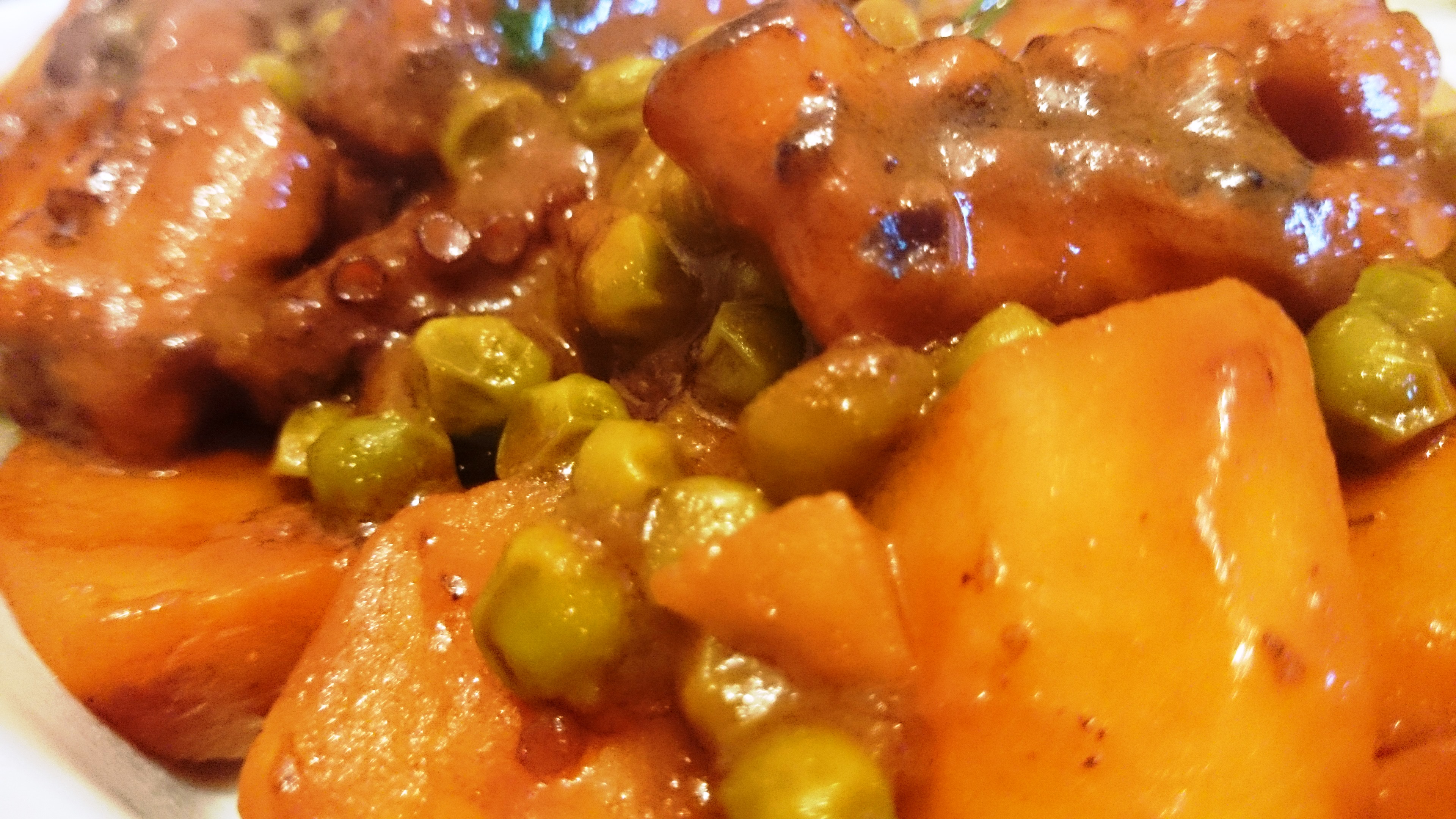 Polpo in umido con patate e piselli