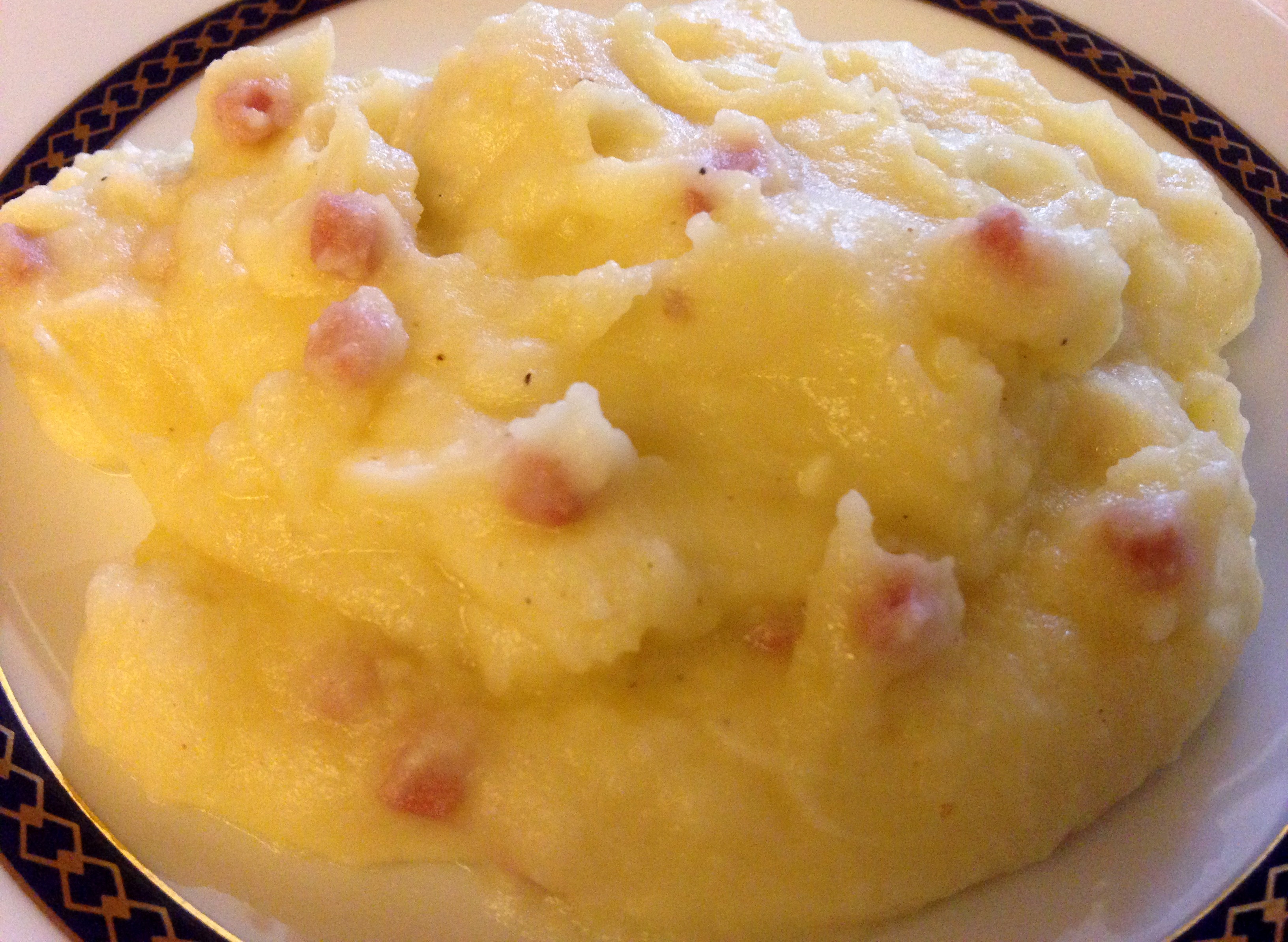 Purè ricco con prosciutto e formaggio filante