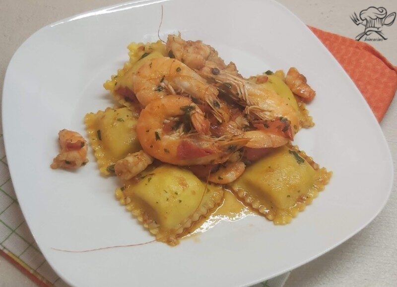 Ravioli di branzino con sugo di pesce